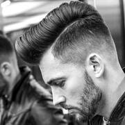 Modern Pompadour with Taper Fade and Beard
