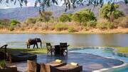 2. Chongwe River House Pool



Πού βρίσκεται: Στο ξενοδοχείο Chongwe River House

Σε ποια πόλη πρέπει να ταξιδέψεις για να τη δεις από κοντά: Zambia, Αφρική

Επιθυμείς μία εμπειρία safari και θέα τους ελέφαντες όσο δροσίζεσαι; Τότε το Chongwe River House είναι η πιο κατάλληλη επιλογή καθώς προσφέρει ένα πανέμορφο deck με πισίνα που βλέπει στον ποταμό Chongwe.

